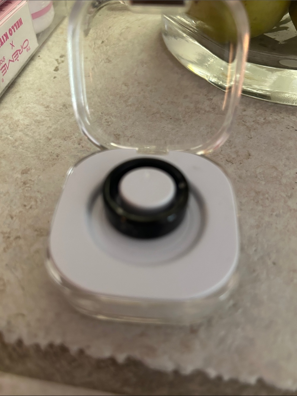 Size 7 Smart Ring. It tracks  many health concerns. It comes with charger case.